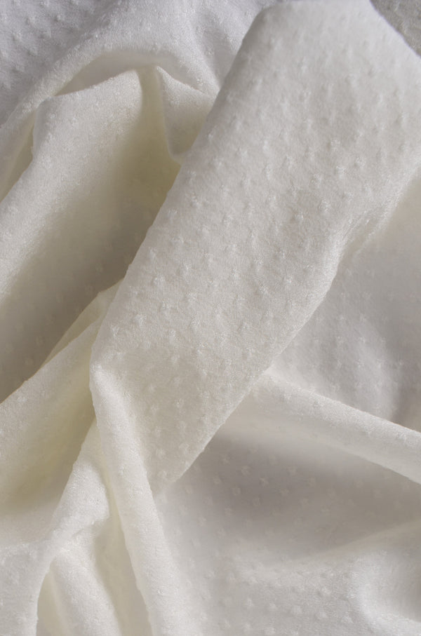 Stretch jacquard with polka dot motif Stretch jacquard with polka dot motif