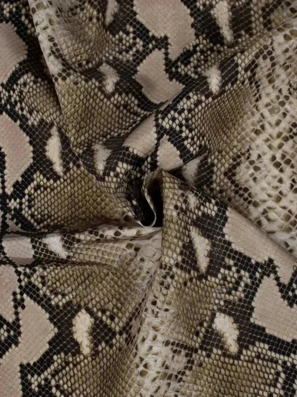 Impermeabile in poliestere stampa pitonata Impermeabile in poliestere stampa pitonata