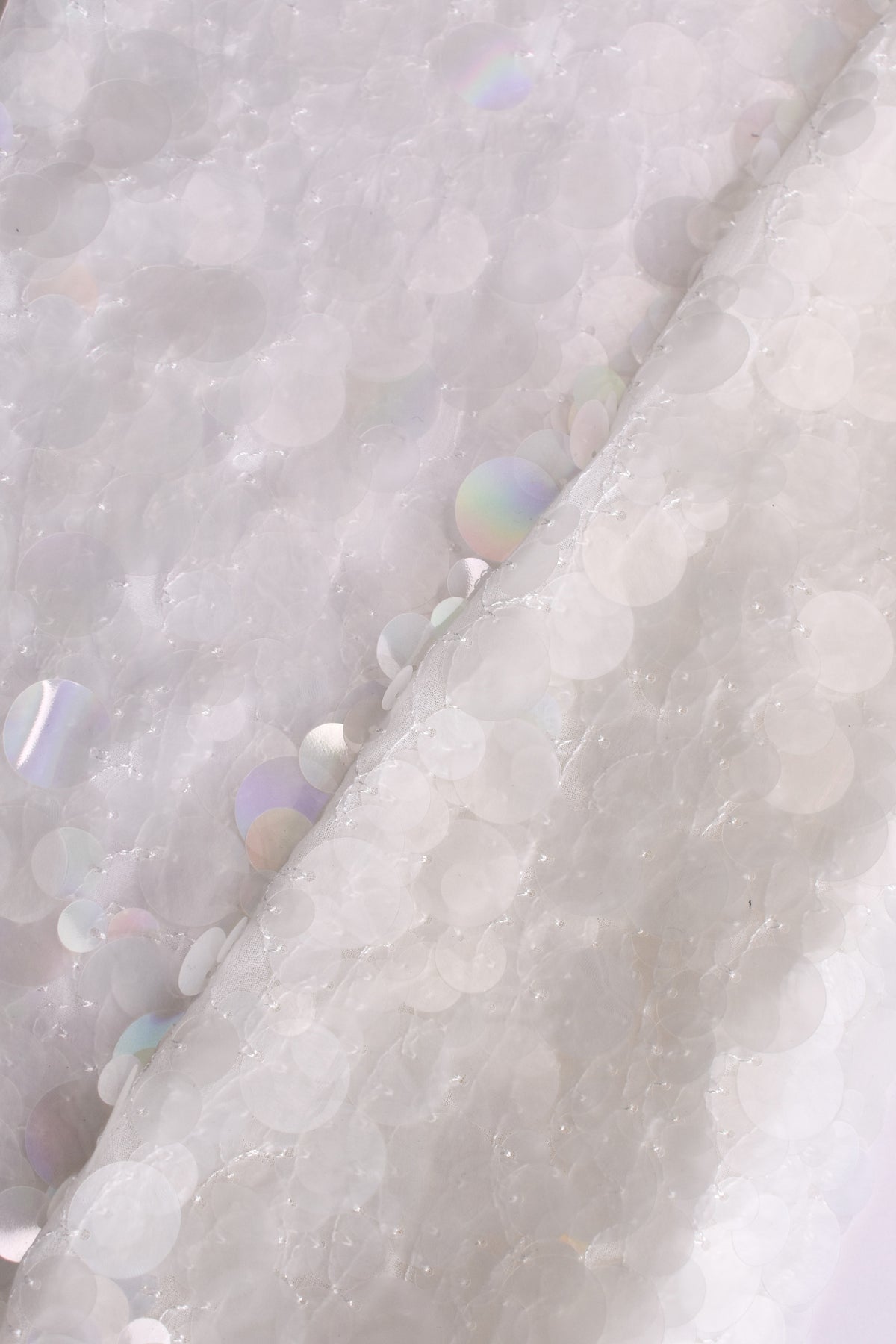 Tessuto paillettes sintetico