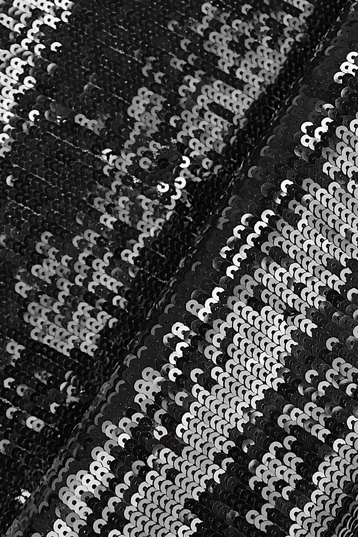 Tessuto paillettes sintetico