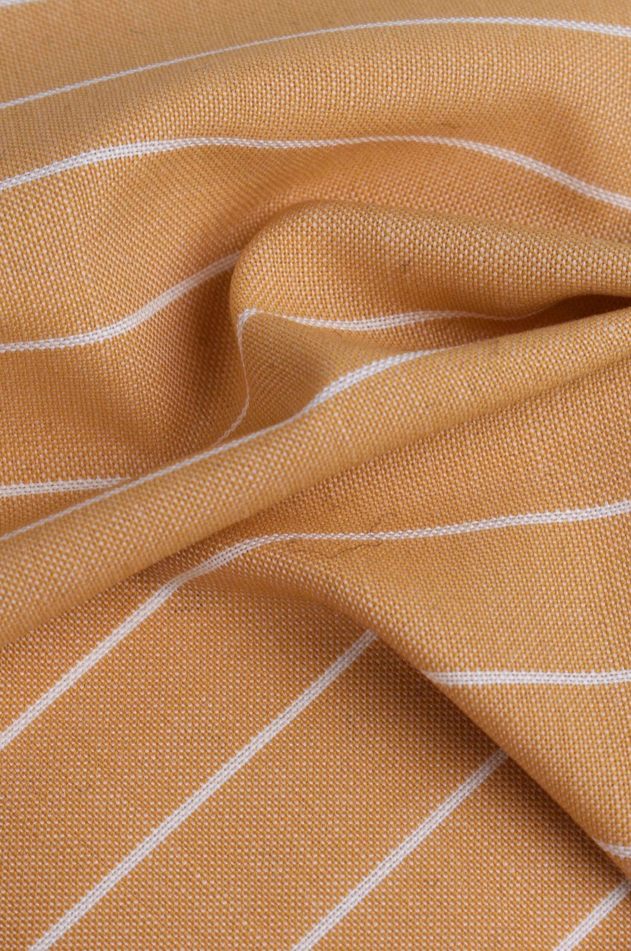 Fresco wool striped in cotton blend, virgin wool, and mohair.