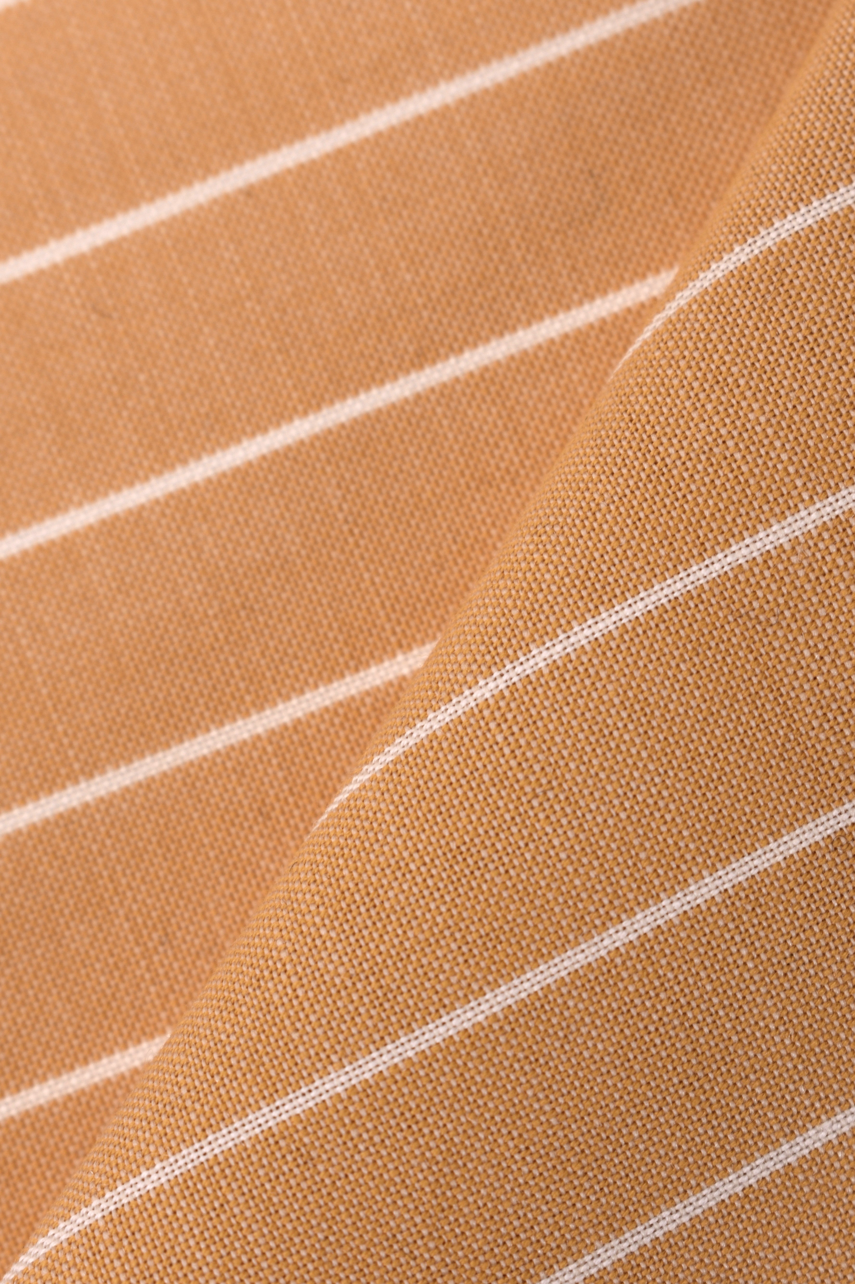 Fresco wool striped in cotton blend, virgin wool, and mohair.