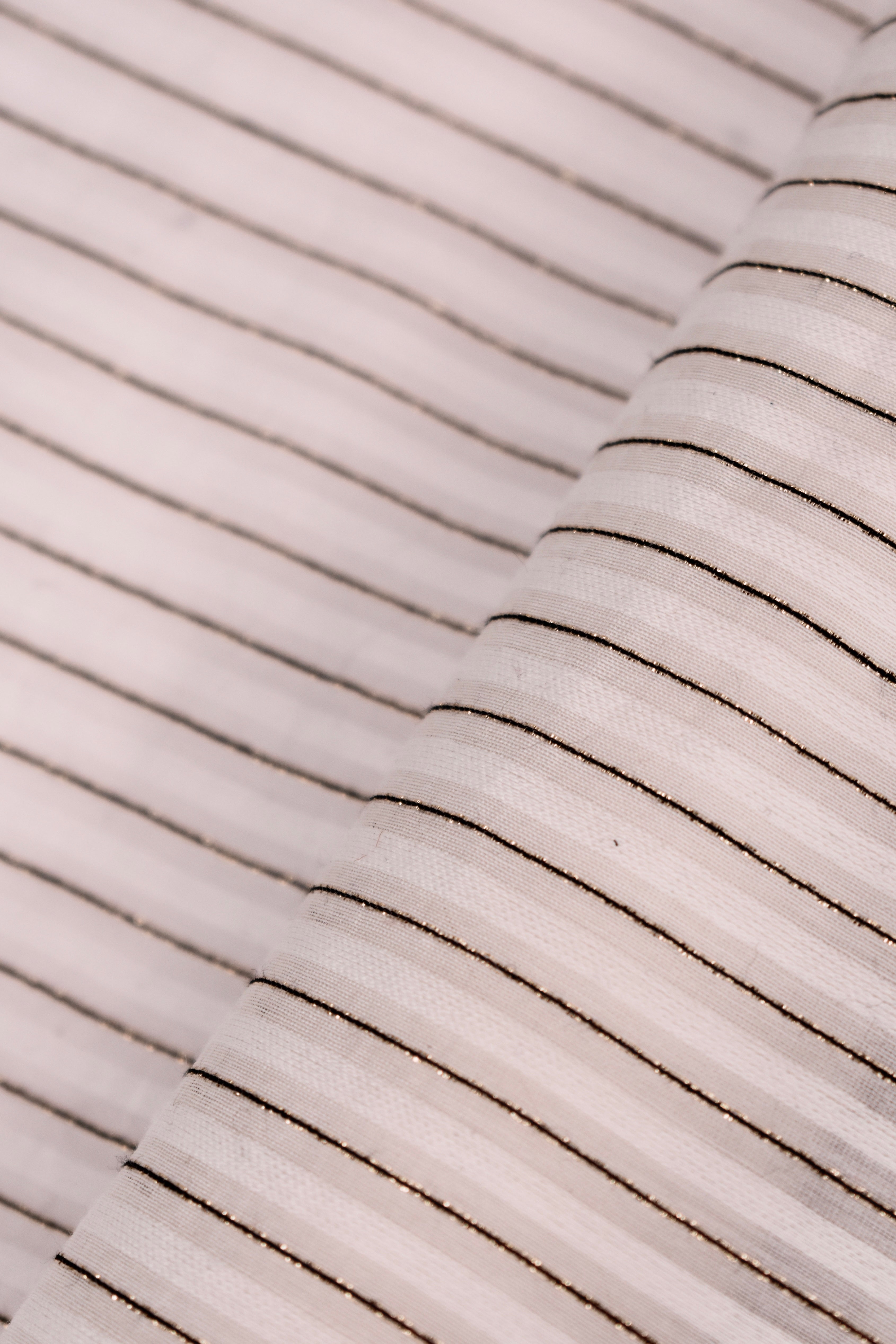 Mussola in cotton and silk blend striped fabric