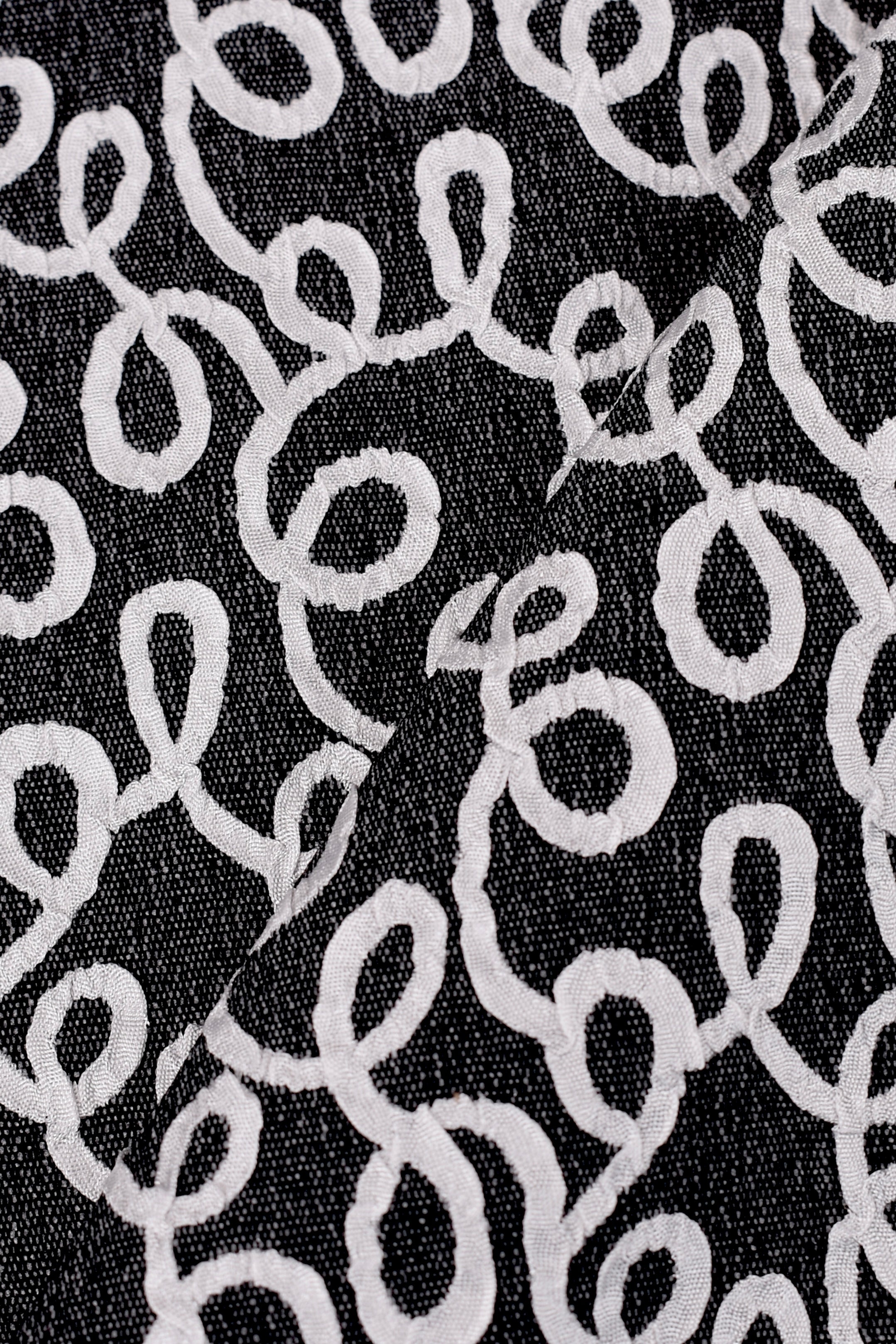 Jacquard sintetico fantasia geometrica