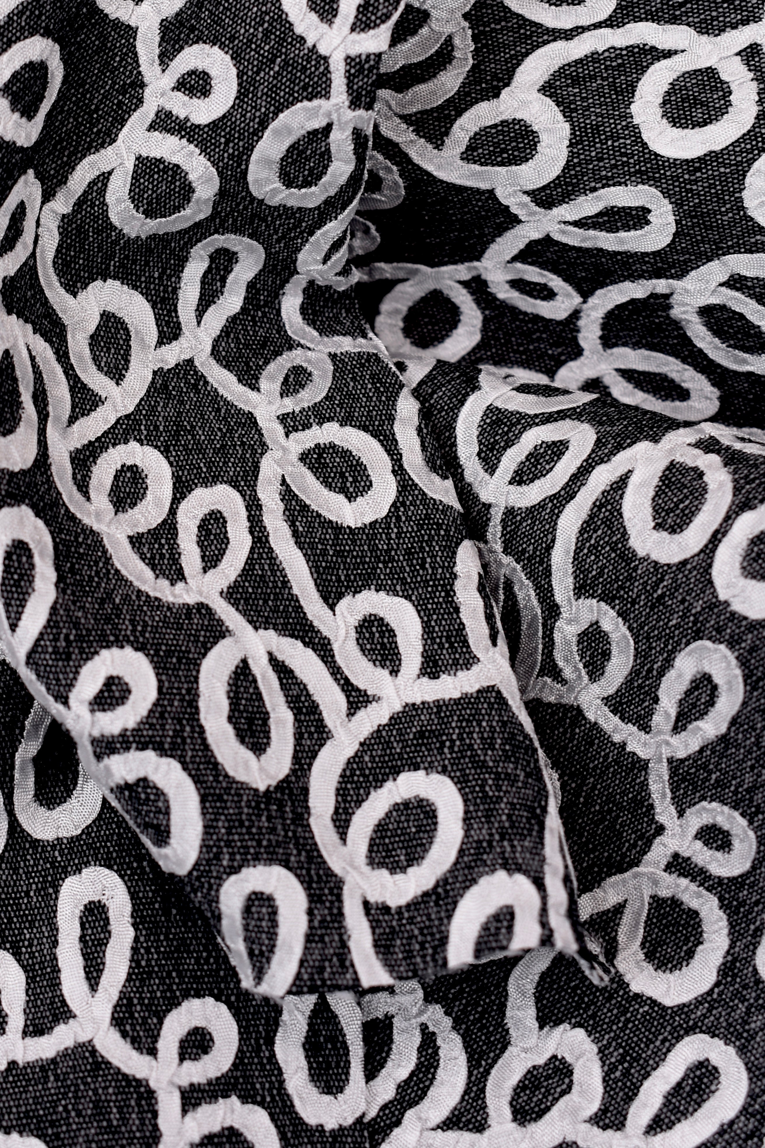 Jacquard sintetico fantasia geometrica
