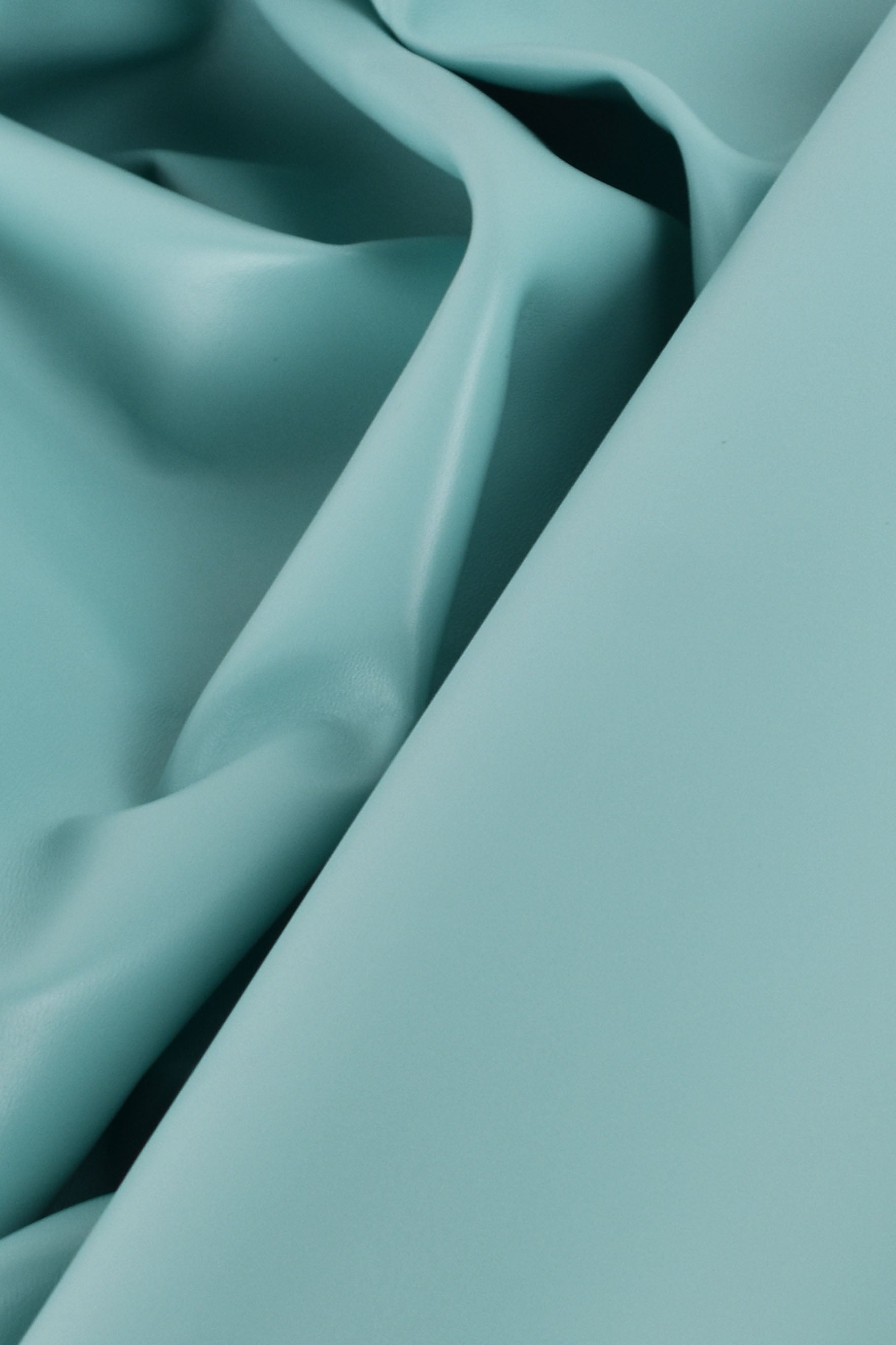 Glänzendes grünes Lammfell