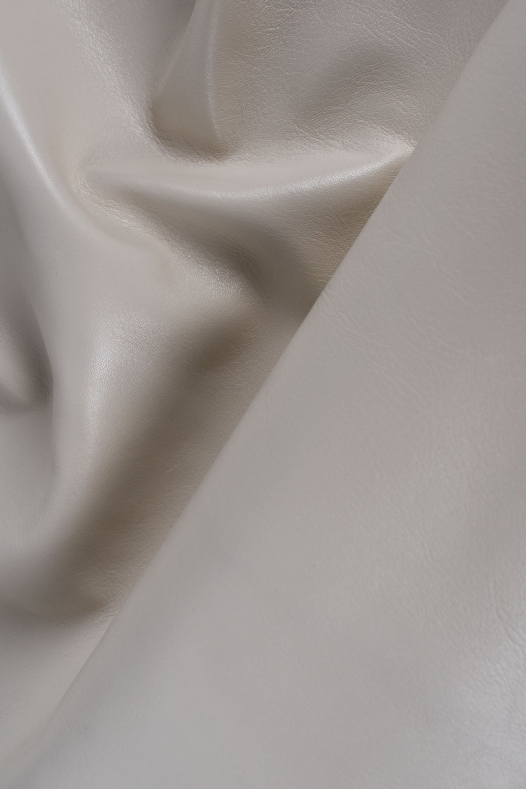 Smooth white shiny goat nappa