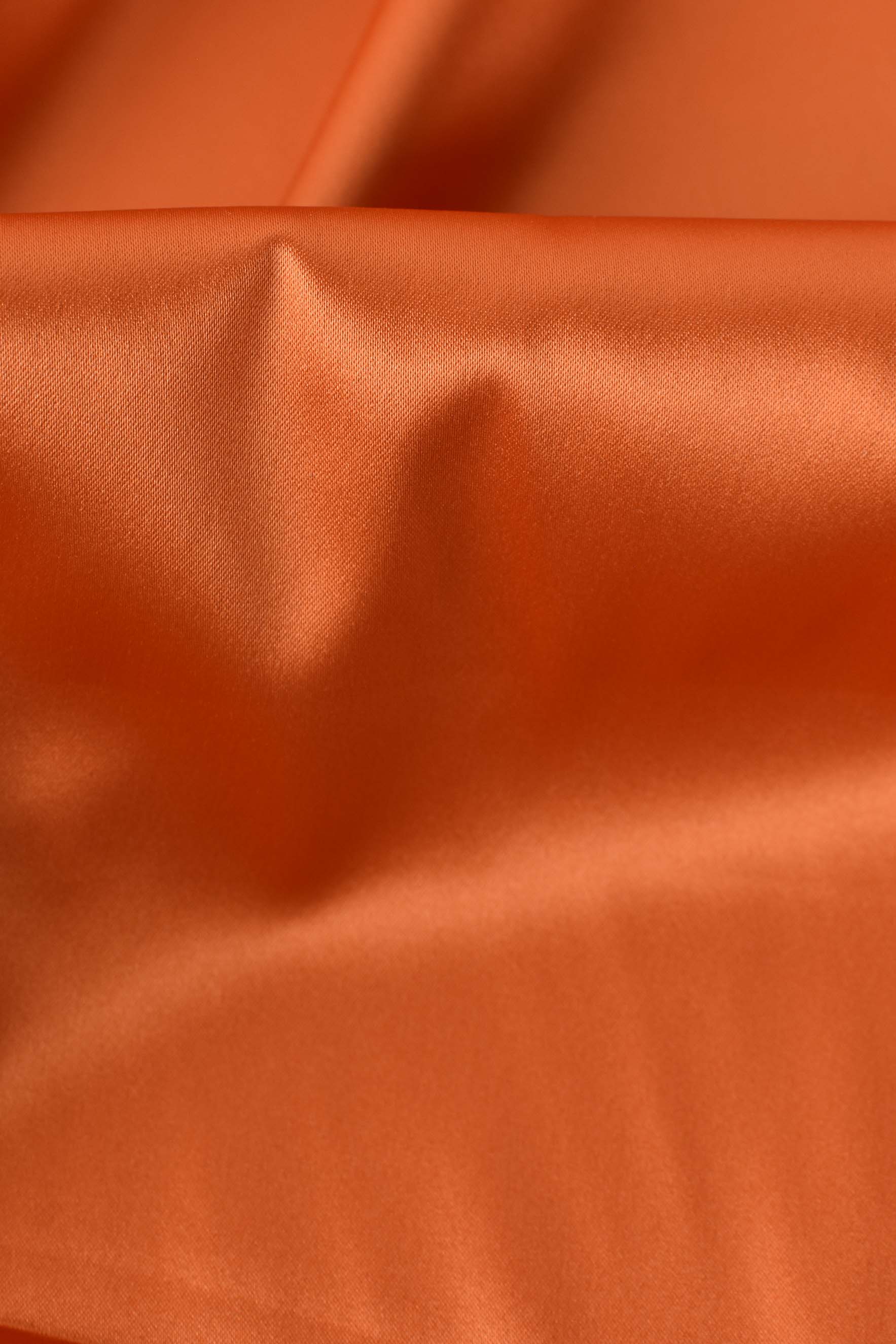 Glossy two-way stretch fabric

