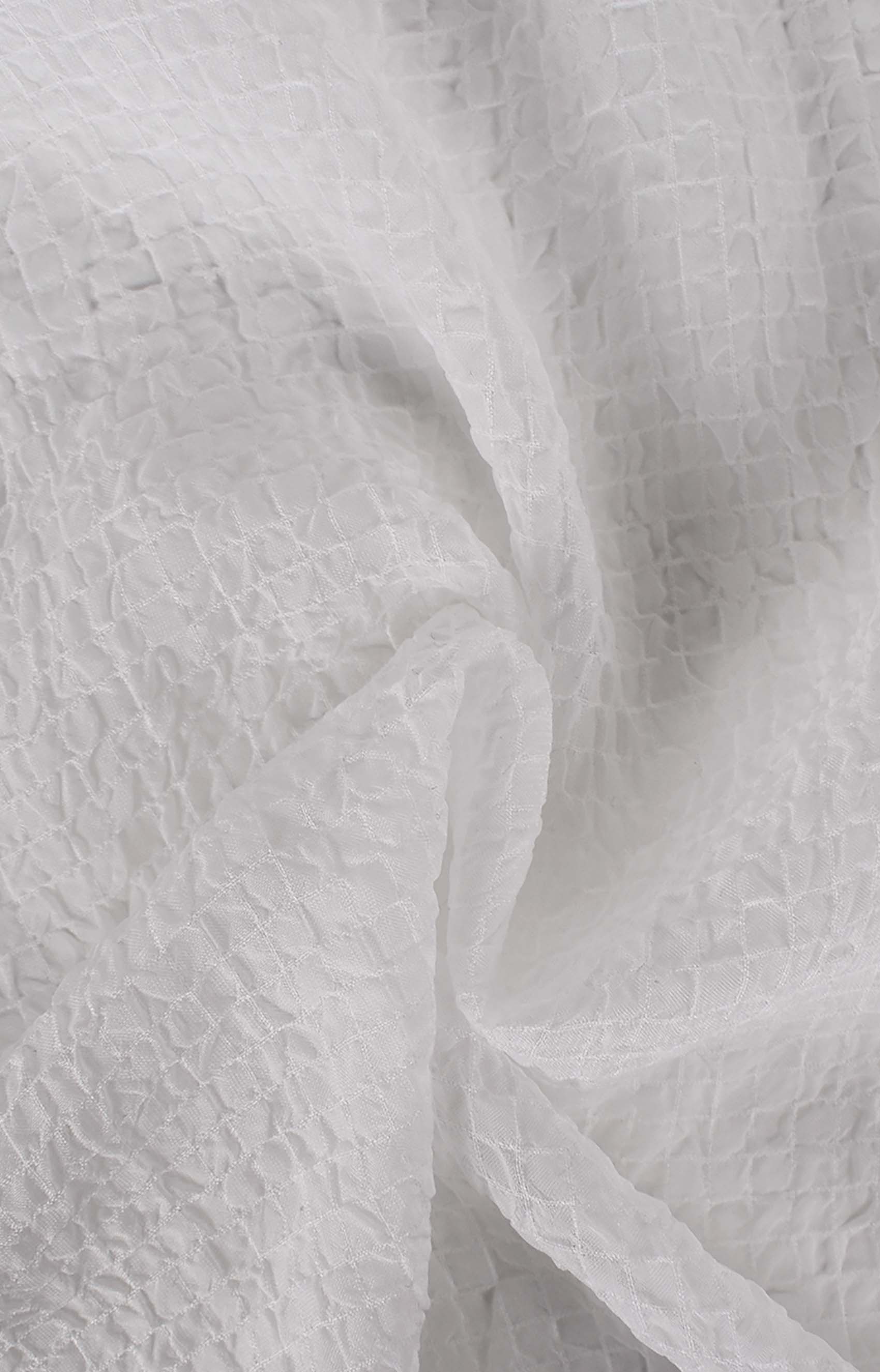 Tessuto goffrato bianco