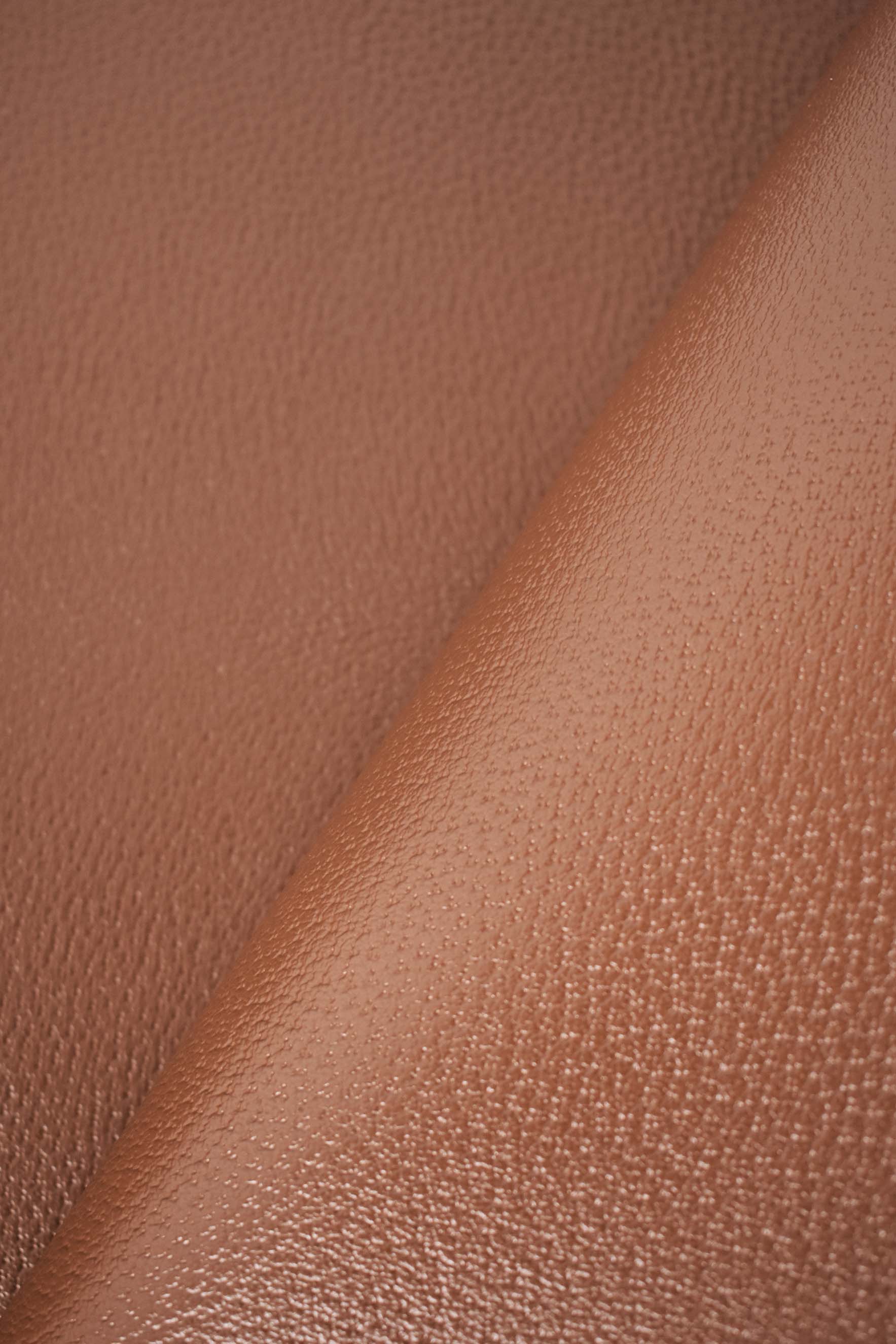 Brown dollar print whole calfskin