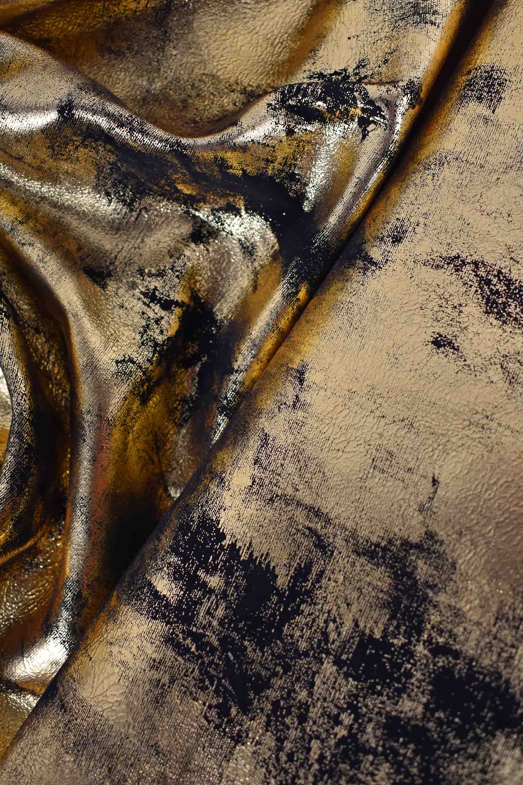 Capretto laminato metalizzato oro