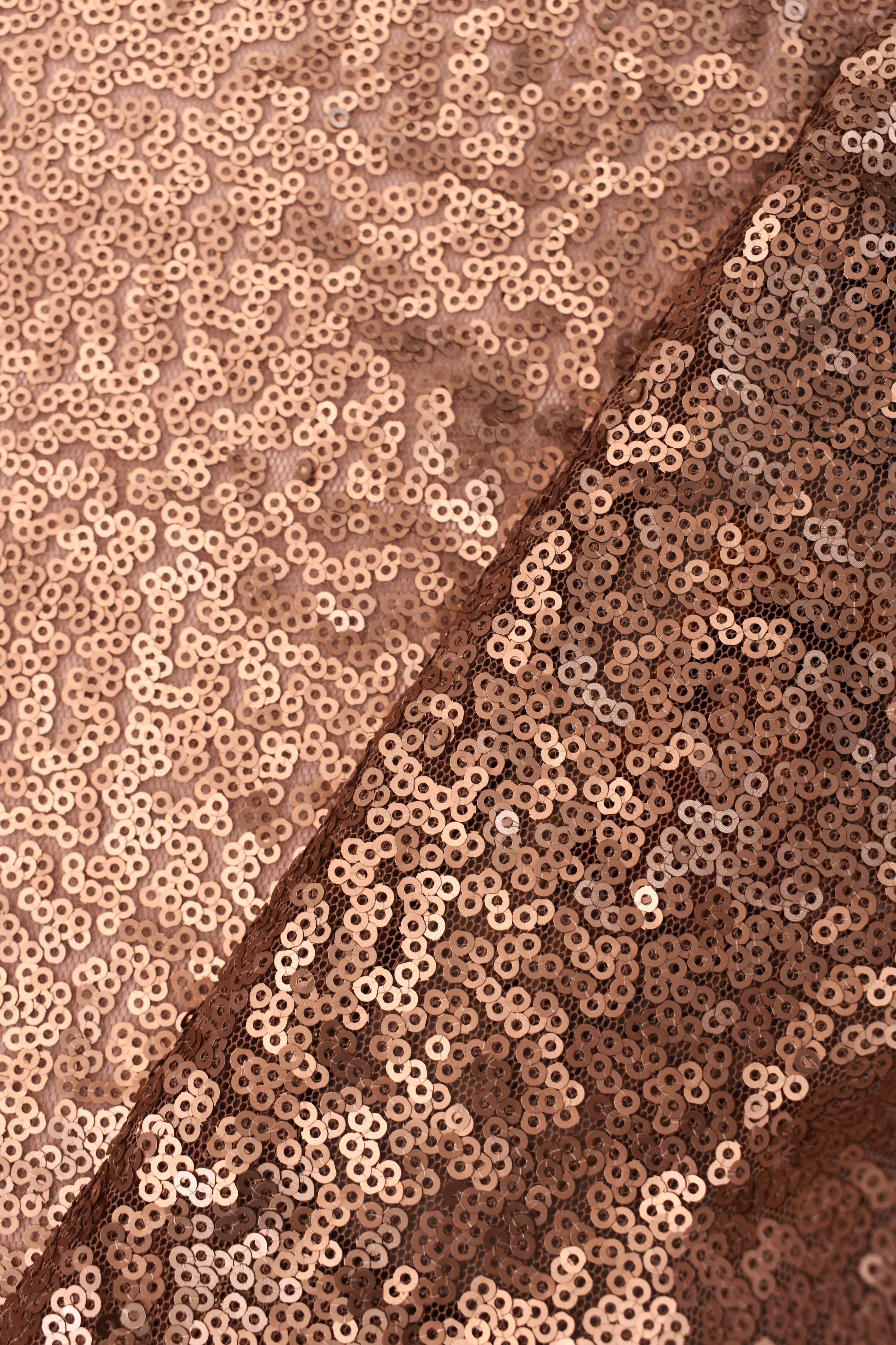 Tessuto in paillettes oro